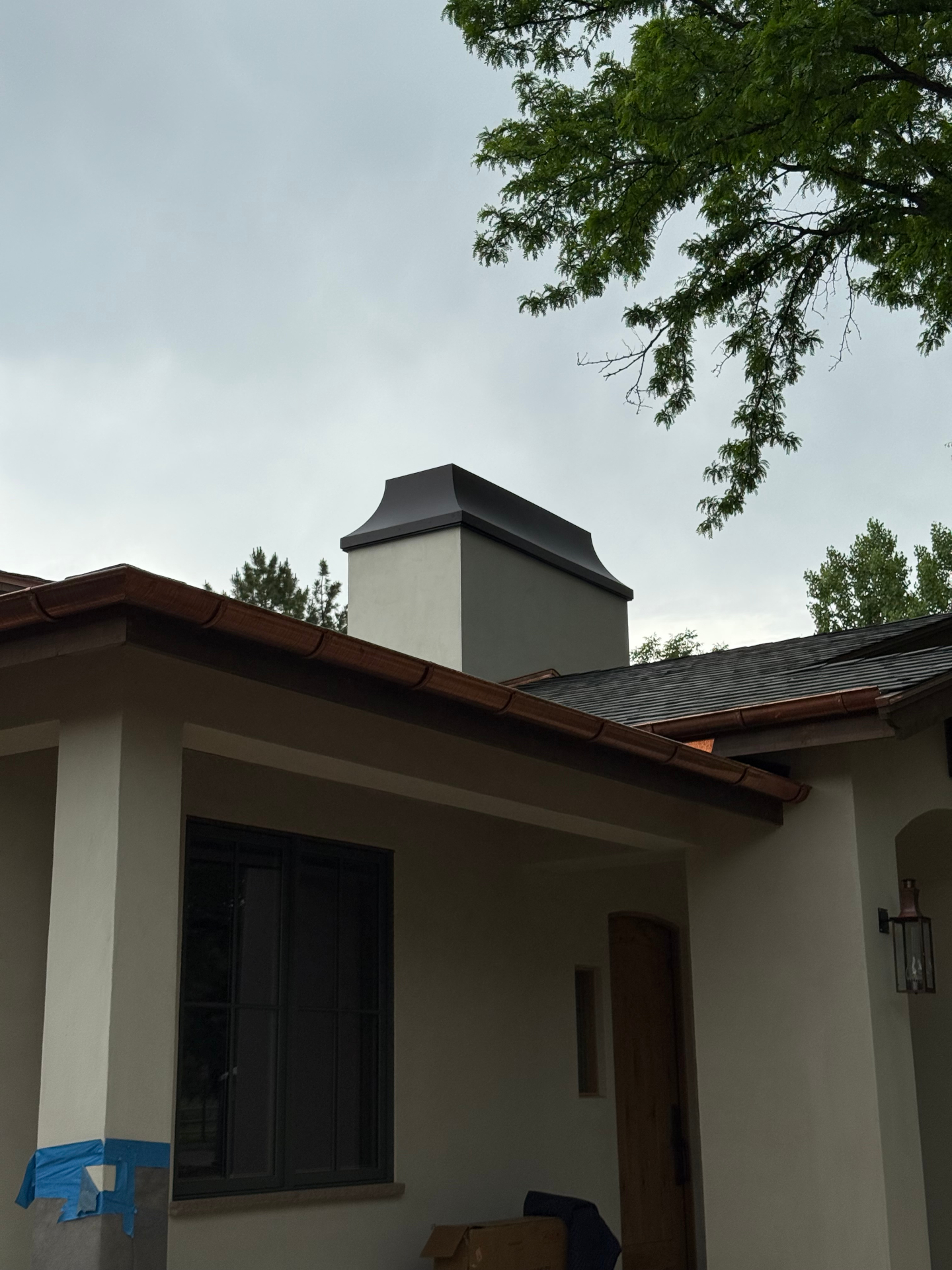 Architectural blackened steel chimney cap